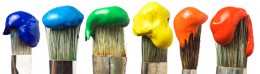 Six brushes with paint Six brushes with paint